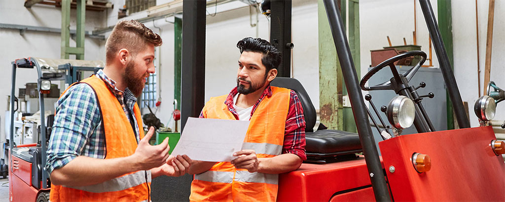 Equipment operators talking to each other